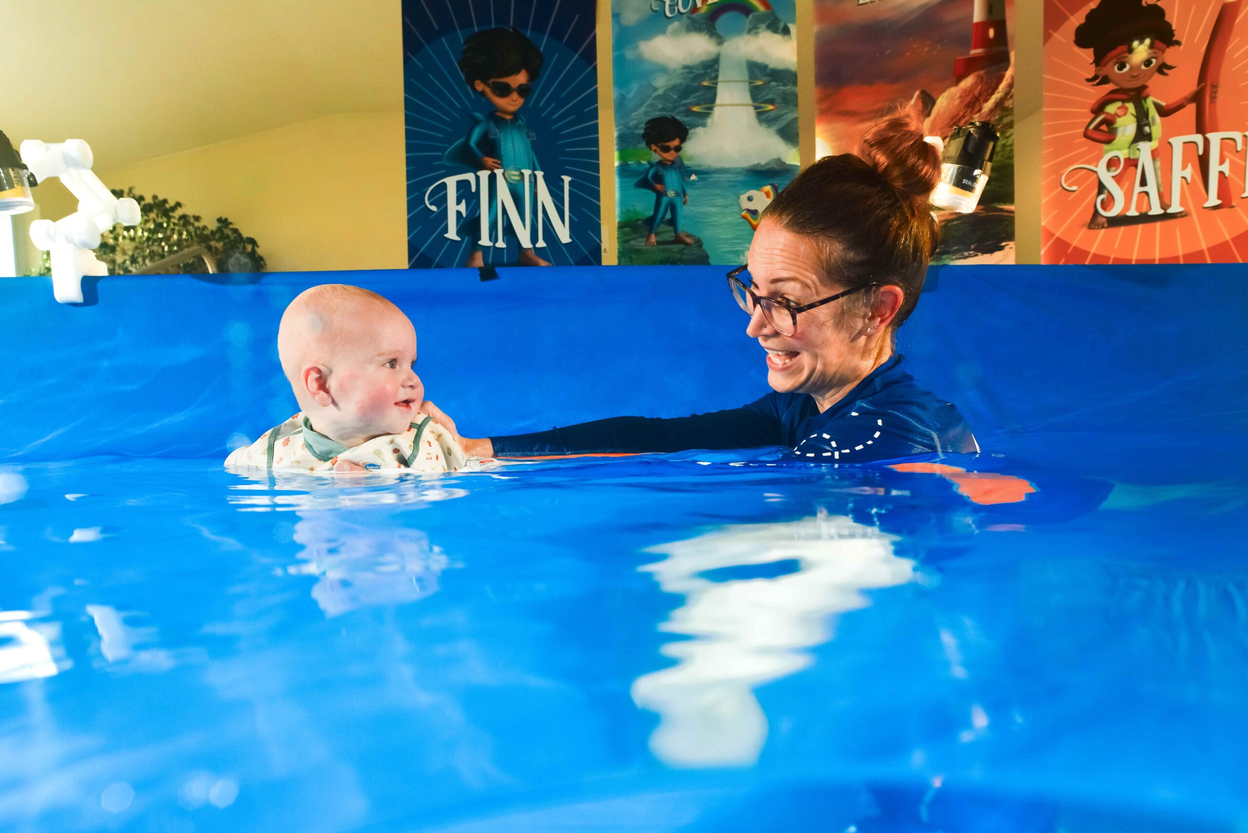 water babies dipper with a baby at an underwater photoshoot